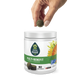 Hand holding a chew, hovering over a container of EverRoot Multi-Benefit soft chews